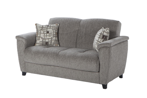 The Aspen Loveseat showcases a modern design with rich leatherette upholstery and diamond piping.