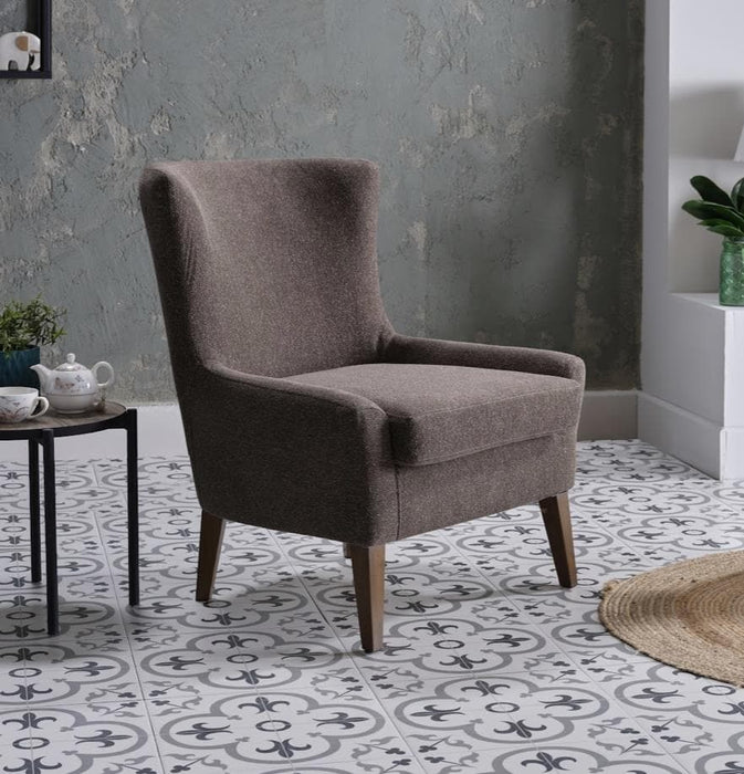 The Canyon Accent Chair's stain-resistant performance upholstery ensures durability and chic style.