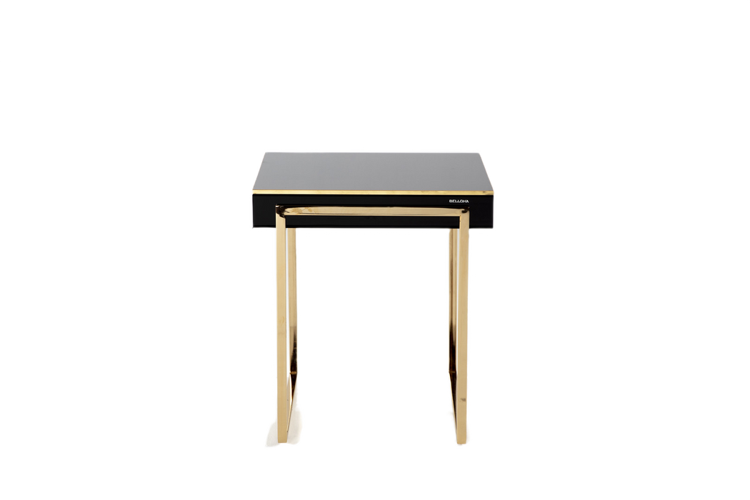 Modern Carlino Side Table with polished surfaces and contemporary design, ideal for any room.