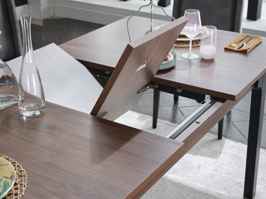 Kennedy Dining Table with a folding leaf mechanism for easy expansion and retraction.