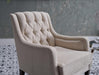 Refined and stylish Pearle Accent Chair with generous proportions and elevated button-tufting. Adds elegance and warmth to your living room or bedroom.