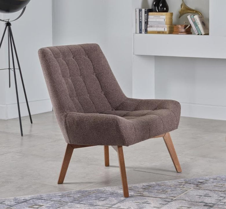 The Revere Accent Chair offers compact elegance with its modern design and high-density foam cushioning. Ideal for small spaces and versatile interior styles.