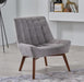 Revere Accent Chair featuring high-density foam cushioning and a wooden frame. Ideal for living rooms, bedrooms, or offices with its modern and comfortable design.
